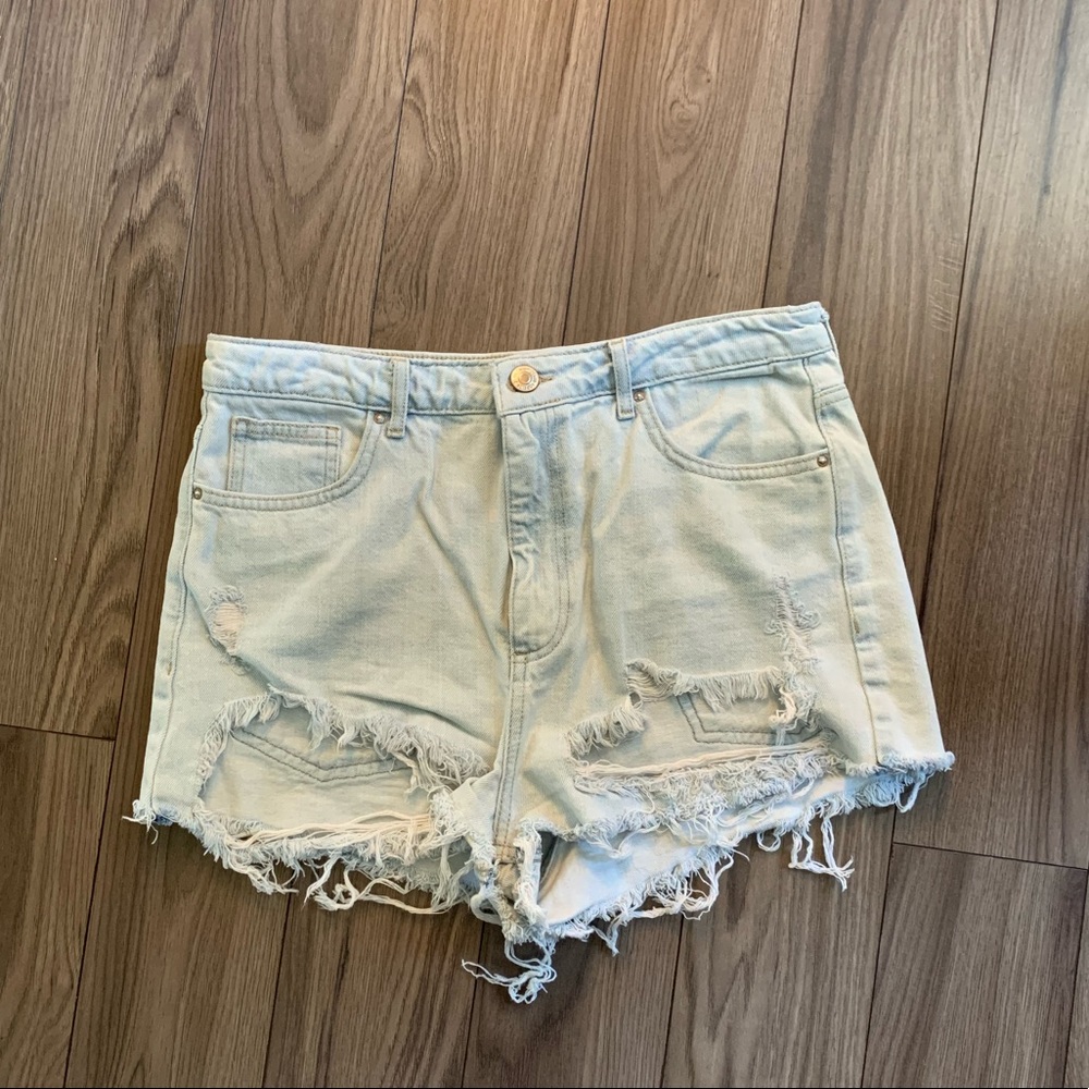 Light wash distressed jean shorts
